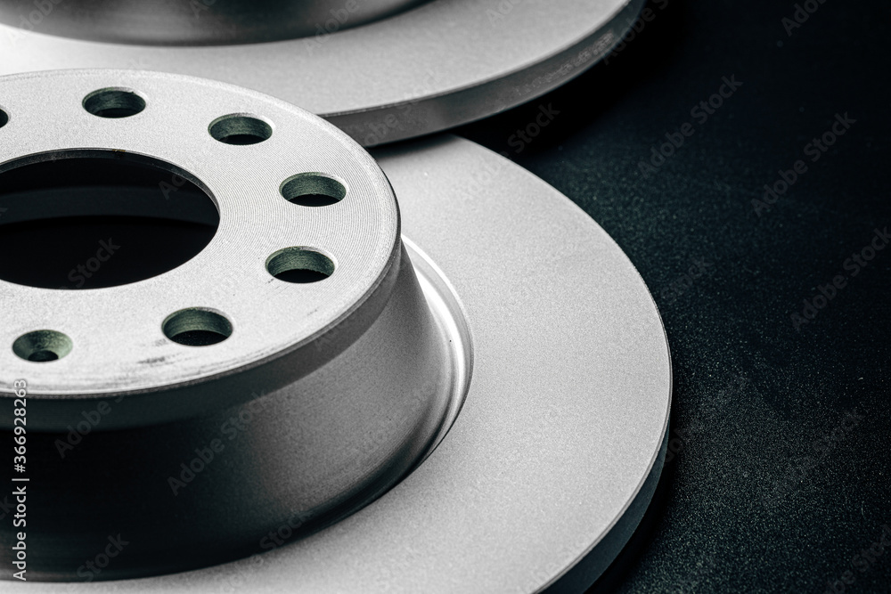 Car break disc on black background close up Car break disc on black background close up