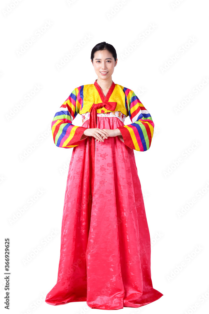 A beautiful Asian woman wearing hanbok is the national dress of Korea. White background. isolated. Clipping path A beautiful Asian woman wearing hanbok is the national dress of Korea. White background. isolated. Clipping path