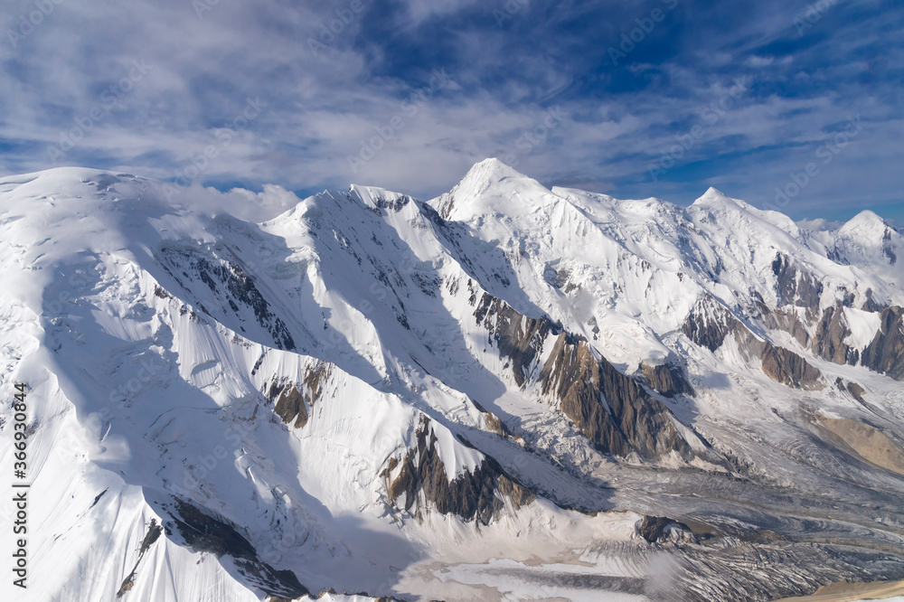 Fototapeta premium Aerial view over the Central Tian Shan Mountain range, Border of Kyrgyzstan and China, Kyrgyzstan