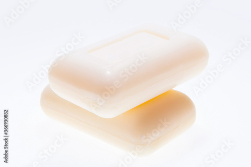 Pieces of soap as protection against coronavirus and other infections isolated on the white © azyryanov