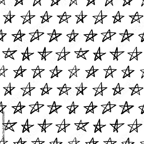 Geometric star vector seamless pattern. Hand drawn doodle stars. Modern black and white background. Scandinavian motif ornament. Pattern for kids clothings, nursery, textile or fabric print.