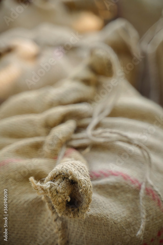 jute bags of dry corn © Niks Ads