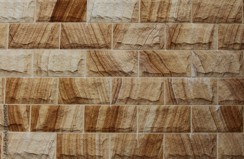 Sandstone block wall with grain. Texture background