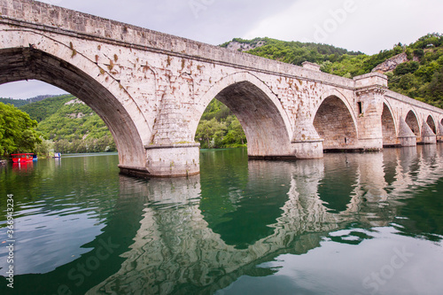 Historic bridge over the Drina River, Famous Tourist Attraction, The Mehmed Pasa Sokolovic Bridge in Visegrad, Bosnia and Herzegovina © mitarart