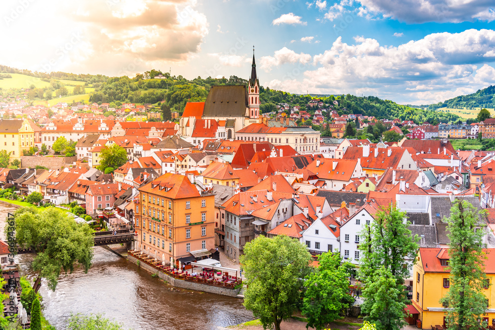 Fototapeta premium Panoramic view of Cesky Krumlov with St Vitus church in the middle of historical city centre. Cesky Krumlov, Southern Bohemia, Czech Republic