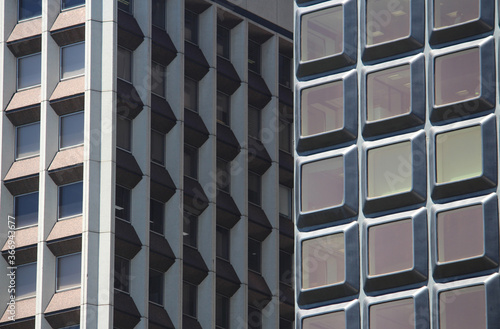Photography Abstract close up of gridded windows of a retro modern buildings side by side