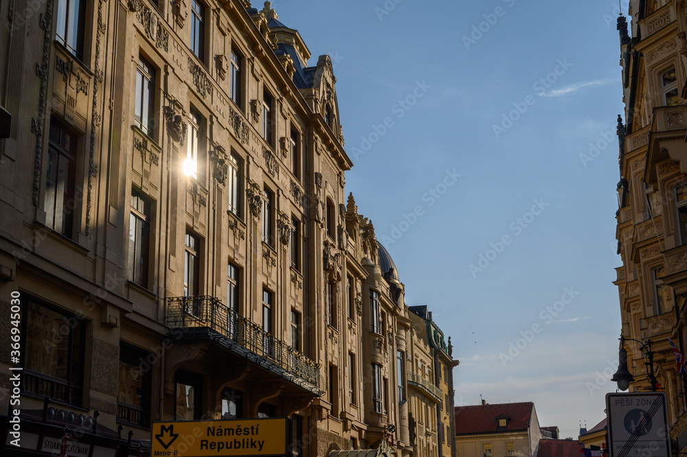 Early evening sunlight reflecting in the windows of old buildings in Prague, Czech Republic