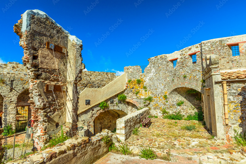 Ancient walls of the never conquered fortress Volterraio. Located between Portoferraio and Rio nell'Elba. Elba Island, Tuscany, Italy.