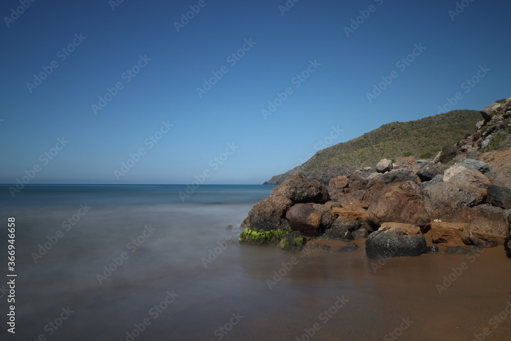 beach and rocks beach and rocks