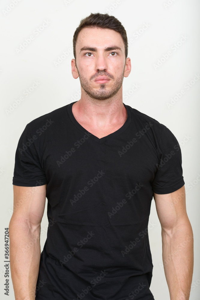 Portrait of handsome bearded man against white background Portrait of handsome bearded man against white background