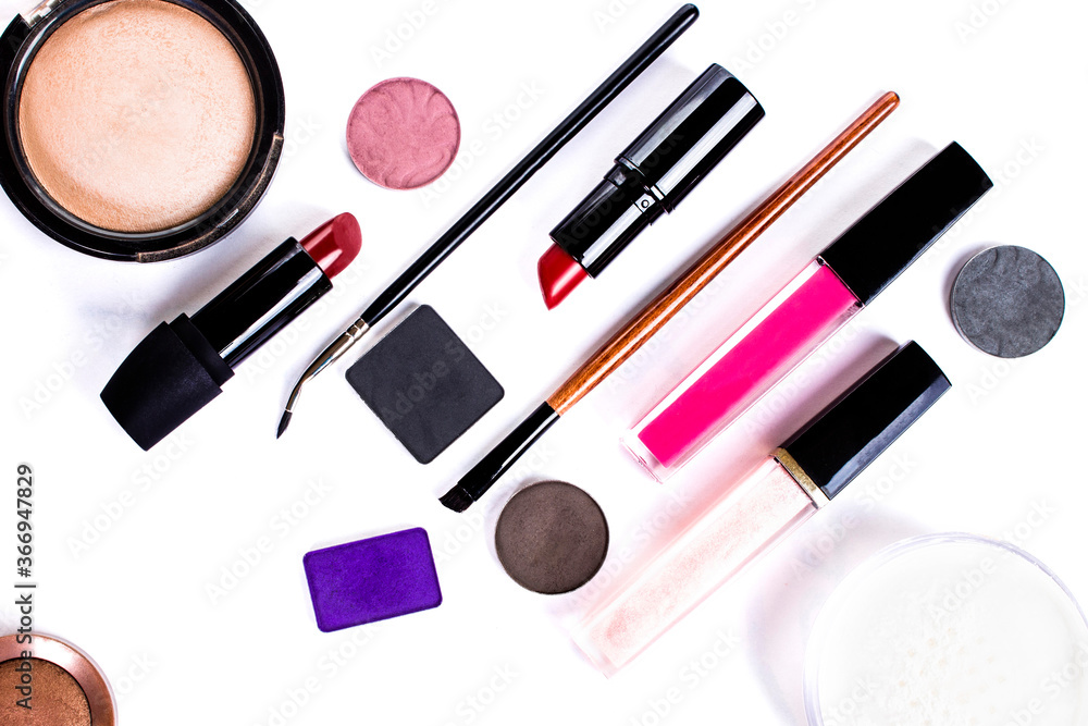 lipstick, eye shadow, makeup brushes on a white background lipstick, eye shadow, makeup brushes on a white background