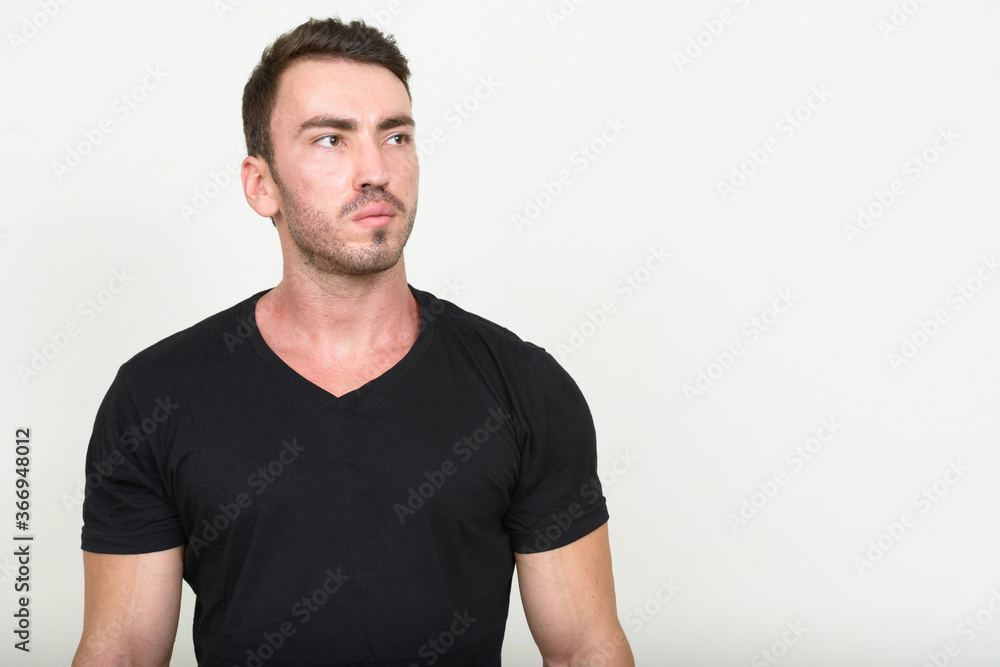 Portrait of handsome bearded man against white background Portrait of handsome bearded man against white background