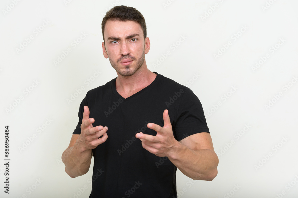 Portrait of handsome bearded man against white background Portrait of handsome bearded man against white background