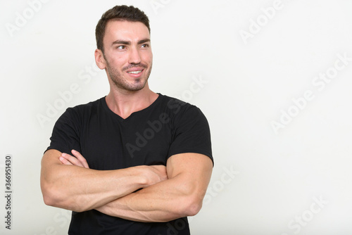 Portrait of handsome bearded man against white background