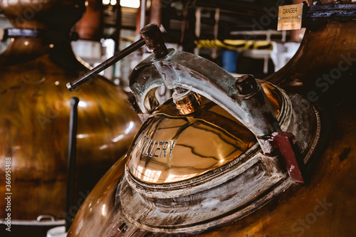 Photos Detail shot of a copper stills main hatch