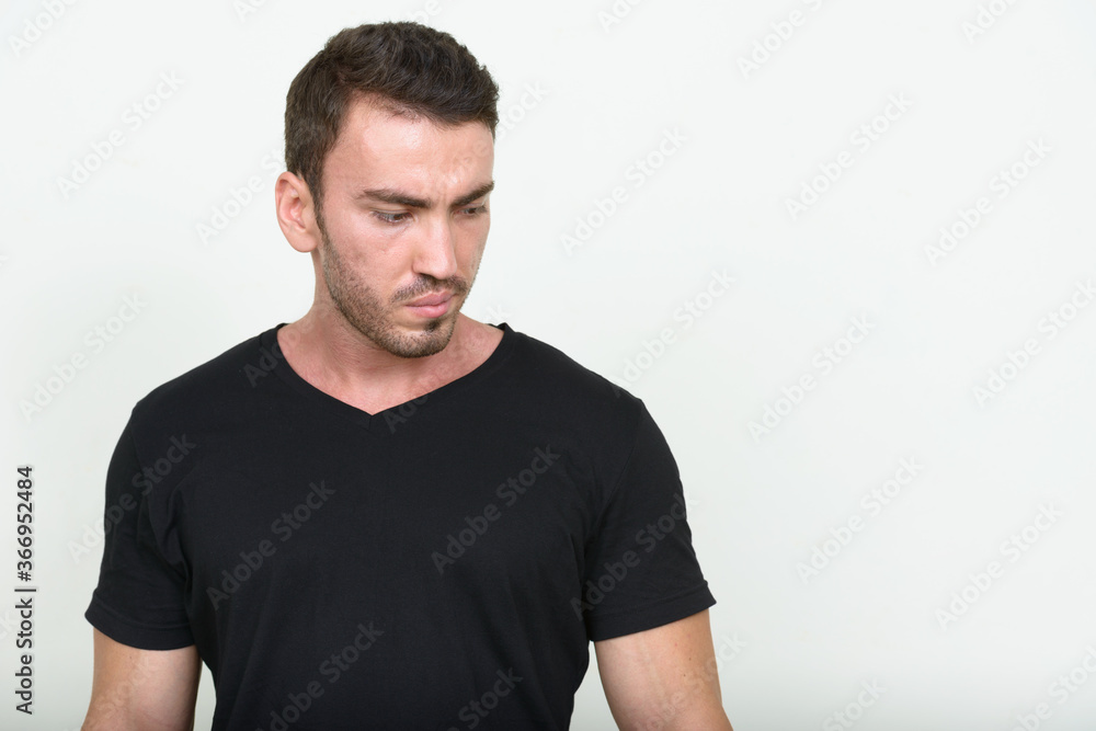 Portrait of handsome bearded man against white background Portrait of handsome bearded man against white background