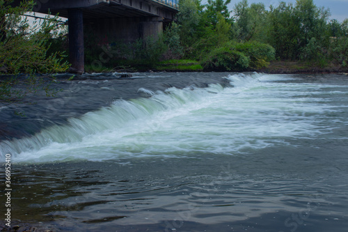 small mountain river waterfall in the morning