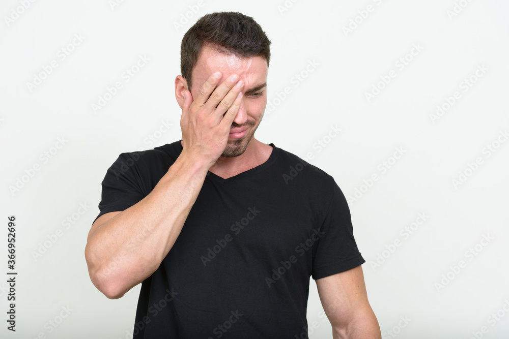 Portrait of handsome bearded man against white background Portrait of handsome bearded man against white background