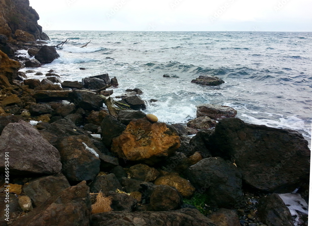 coast sea gravel rock photo background image