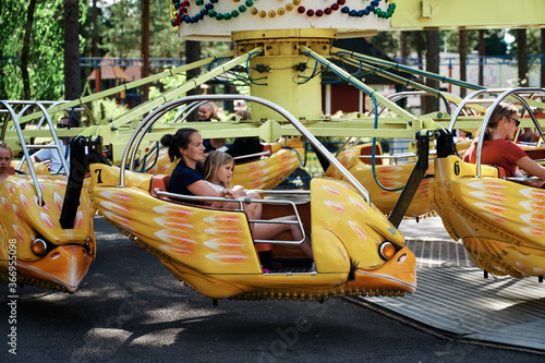 Family trip in amusement park Finland. © SteinOve