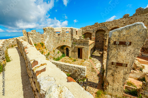 View of ruins from the city walls of Castello del Volterraio or Volterraio Castle, the oldest fortress on Elba Island, Tuscany, Italy between Portoferraio and Rio nell'Elba. photo