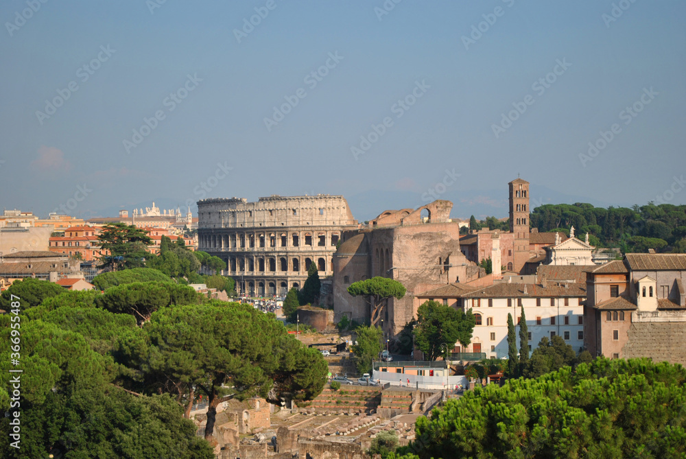 View on the iconic gladiatorial arena the Flavian Amphitheatre Colosseum and the Temple of Venus and Rome from the Vittoriano's terrace