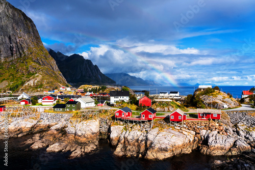 Tableau sur toile Famous tourist attraction Hamnoy fishing village on Lofoten Islands, Norway with red and yellow rorbu houses