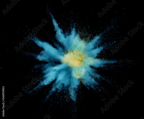 Abstract coloured powder explosion on black 