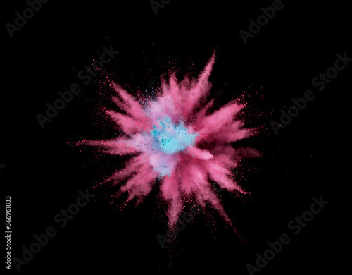 Abstract coloured powder explosion on black