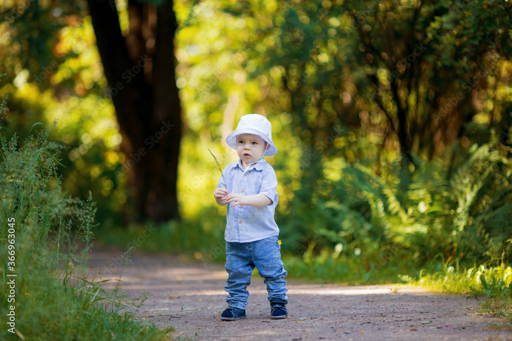 Child running in an apple orchard in spring Child running in an apple orchard in spring