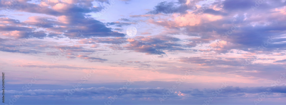 Dramatic sunset clouds and full Moon Dramatic sunset clouds and full Moon
