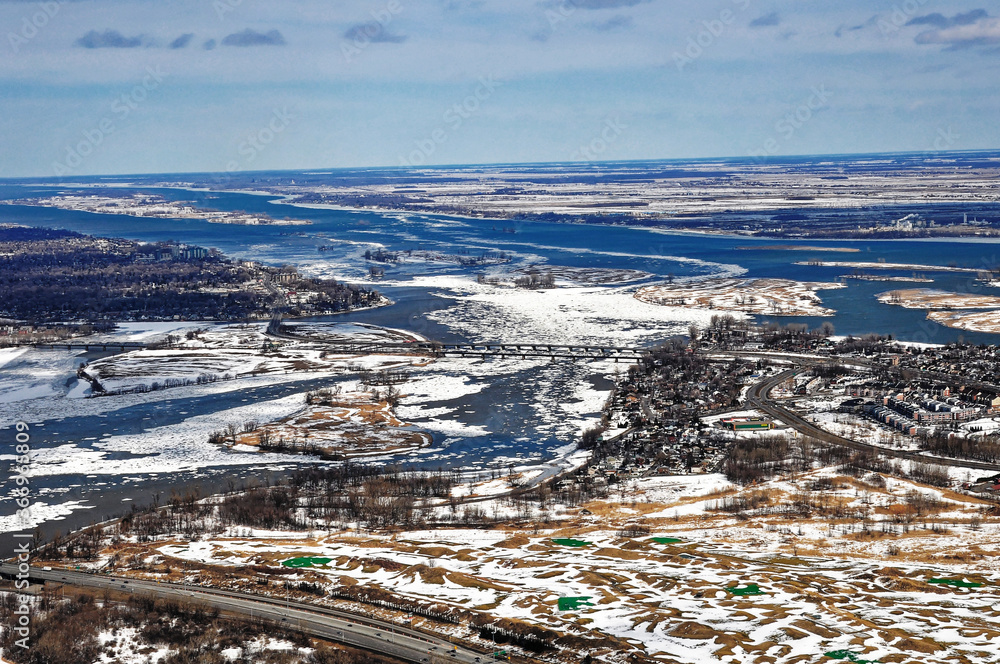 Aerial view of the St. Lawrence River in winter east of Montreal