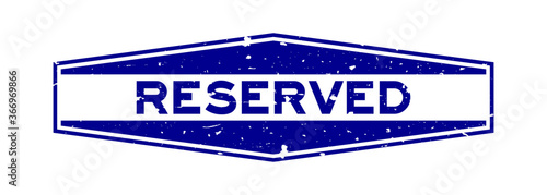 Grunge blue reserved word hexagon rubber seal stamp on white background