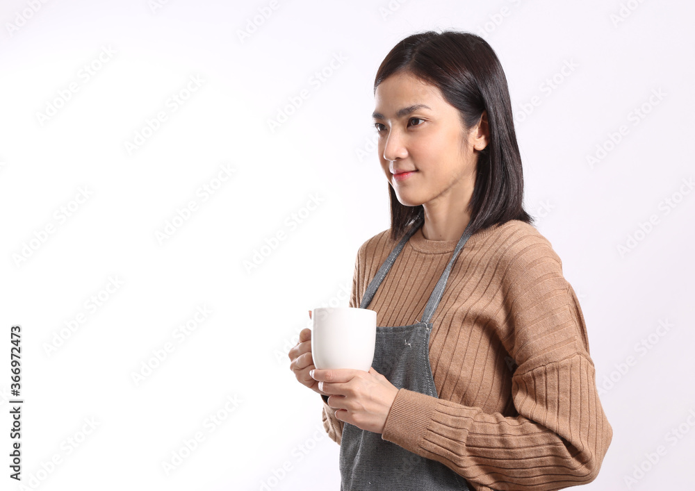 The Asian woman standing on the white background. The Asian woman standing on the white background.