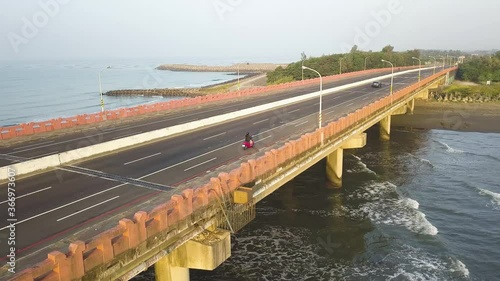 Aerial shot of Electric Scooter on Sicao Bridge Tainan Taiwan photo
