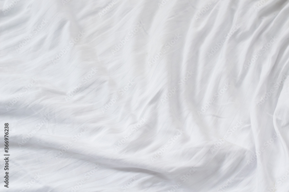 pleated white cotton material. texture or background