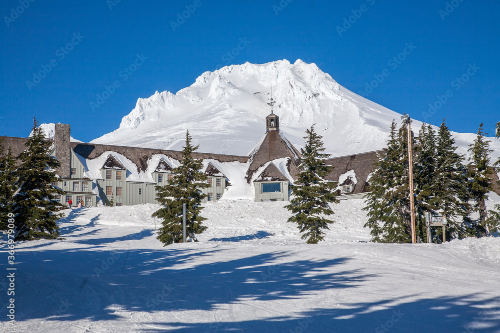 Mt Hood, Oregon;  Mt Hood with a lodge in the foreground, Oregon, Mt Hood National Forest.