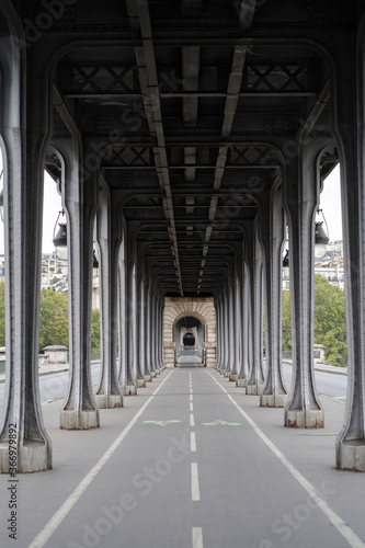The Bir-hakeim bridge in Paris over the river Seine. The perspective of the support pillars at the iron structure.