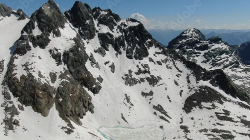 Stupendo paesaggio  d'alta montagna con rifugio alpino sulle Alpi Retiche visto dall'alto - Massiccio del Bernina photo