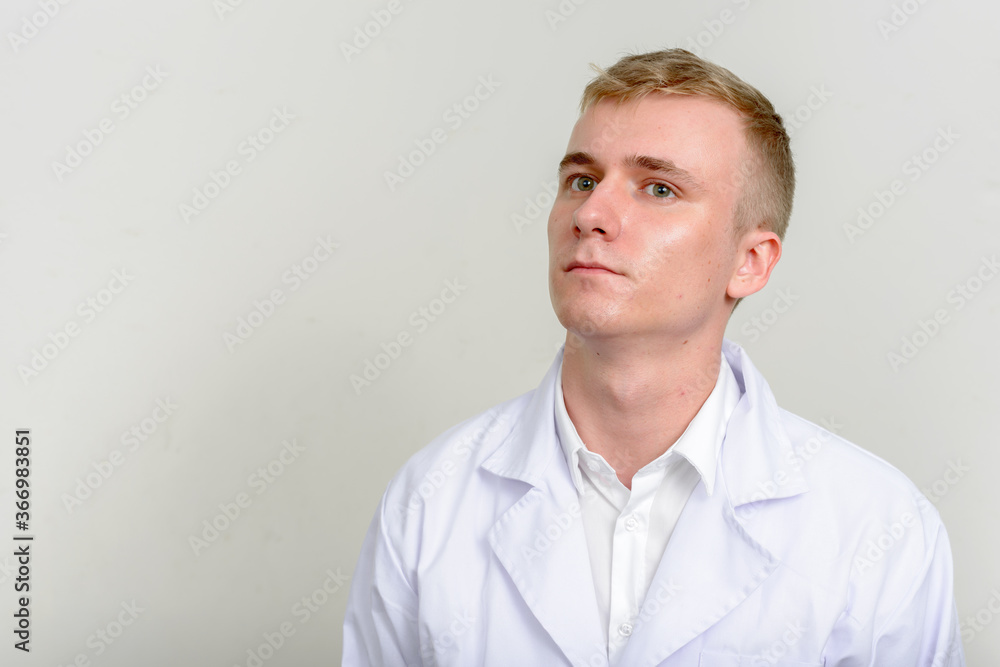 Portrait of young man doctor with blond hair Portrait of young man doctor with blond hair