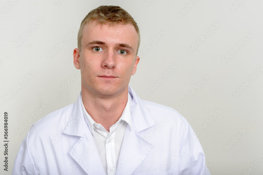 Portrait of young man doctor with blond hair Portrait of young man doctor with blond hair