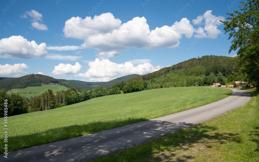 Landscape of Sauerland region close to Winterberg with a hiking trail, Germany