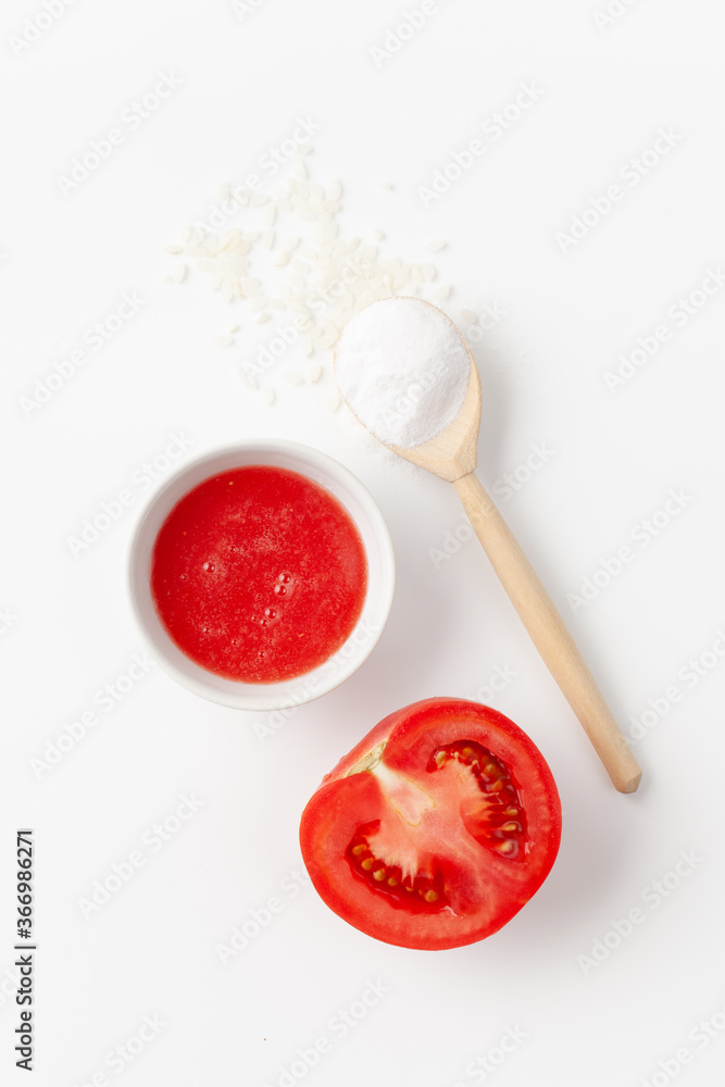 Top view of organic natural tomato juice and rice flour Top view of organic natural tomato juice and rice flour