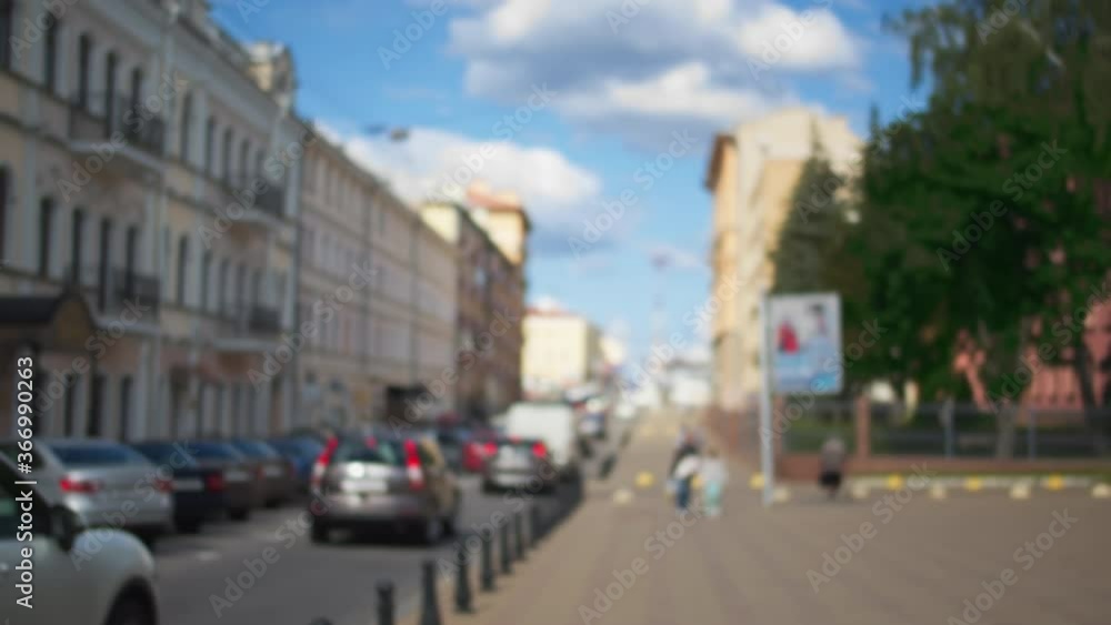 The movement of cars along the city street, blurred background, camera movement The movement of cars along the city street, blurred background, camera movement