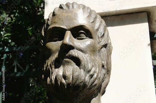 Greece, Athens, June 16 2020 - Statue of Euripides, one of classical Athens's three great tragic dramatists, along with Aeschylus and Sophocles. photo