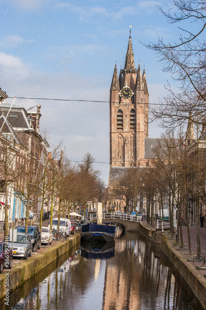 Rotterdam, Netherlands;  Reflection of a church tower in one of many canals in Rotterdam,