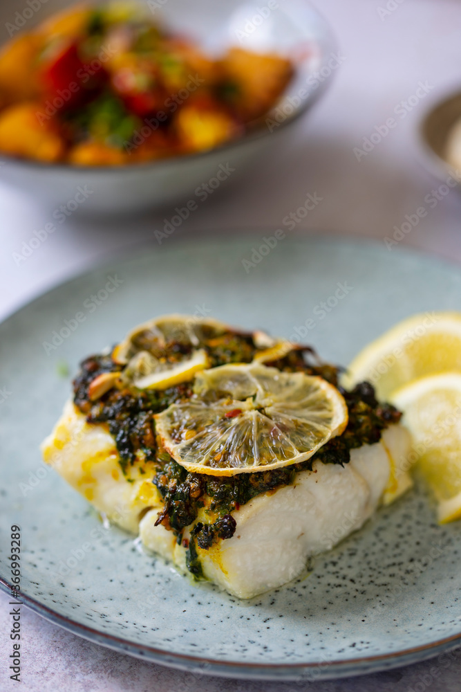 Cod fillets with coriander crust, lemon and bay leaf Cod fillets with coriander crust, lemon and bay leaf