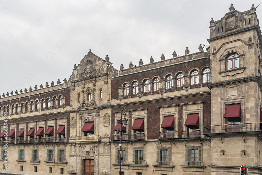 Architectural fragment of Palacio Nacional (National Palace or President's Palace). National Palace is the seat of the federal executive in Mexico. Zocalo, Plaza de la Constitucion, Mexico City.