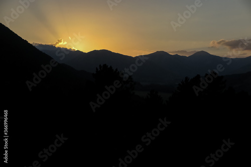 Wallpaper Mural Last rays of sun behind the silhouettes of the mountains, Opi commune, Abruzzo region, Aquila province, Italy Torontodigital.ca