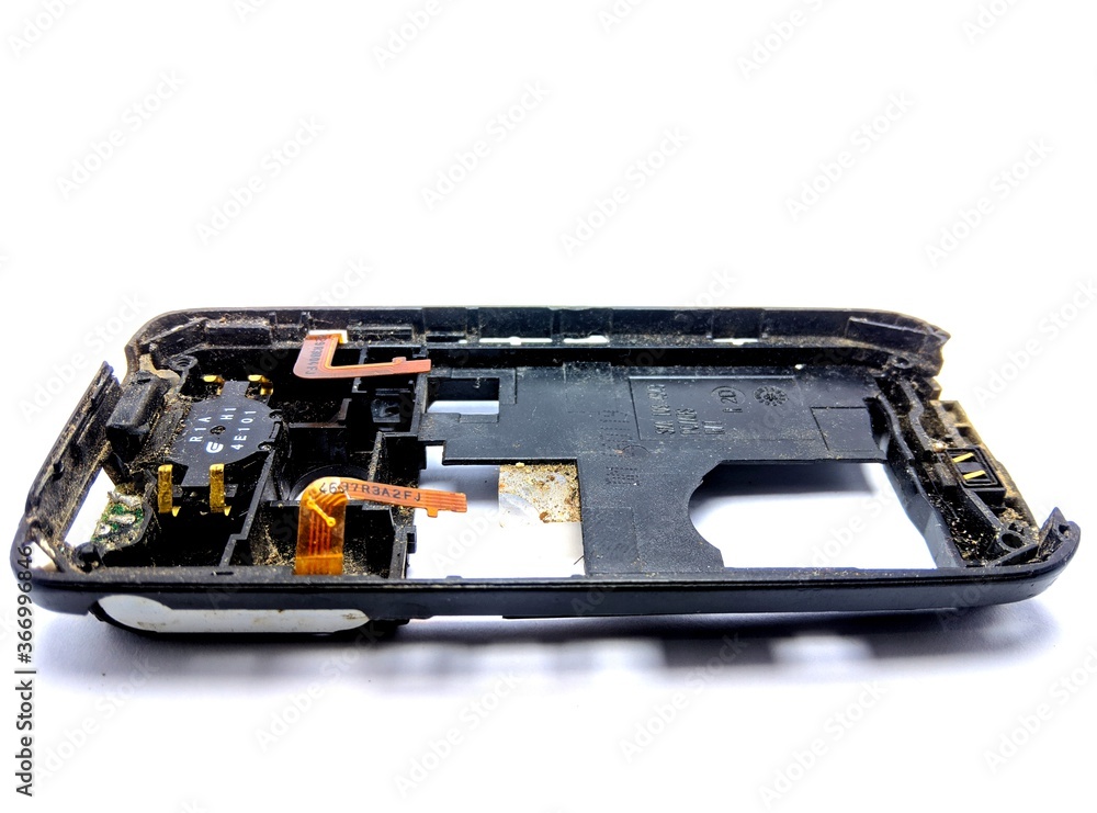 The old mobile machine was isolated from a white background The old mobile machine was isolated from a white background